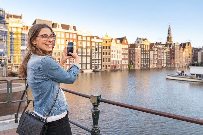 Amsterdam Red Light District Walking Tour in EN/DE/IT/ES - Amsterdam Centraal focus: legality, prices, and safety questions