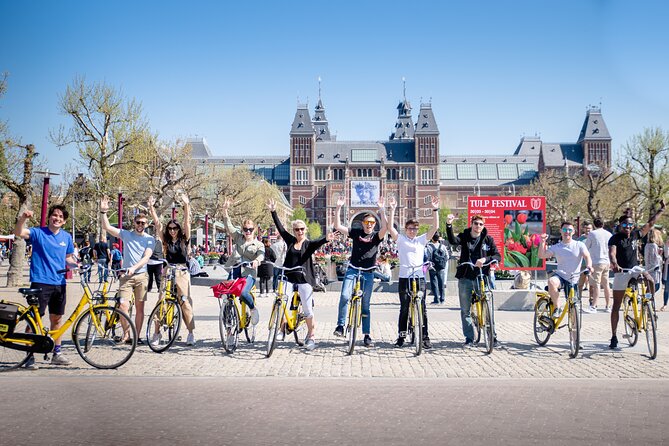 Amsterdam Small Group Bike Tour - Meeting at Nieuwezijds Kolk and getting ready fast
