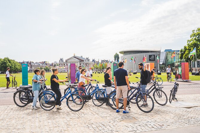 Amsterdam Small-Group Bike Tour With Optional Canal Cruise - Meet at Nieuwezijds Voorburgwal: start strong and avoid the chaos