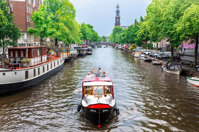 Amsterdam Small-Group Canal Cruise With Dutch Snacks and Drink - Westerkerk and the canal view of Amsterdam’s religious heart