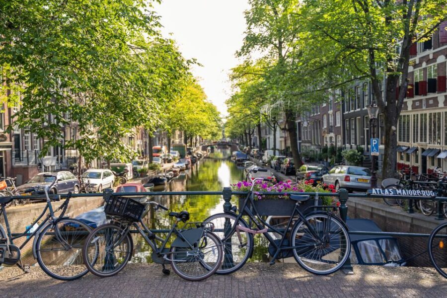 Amsterdam Small-Group Walking Tour - Entering Amsterdam via Beursplein: where the tour starts with purpose