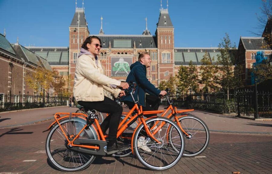 Amsterdam: Top Highlights Guided Bike Tour EN/DE/ES/FR/IT/CN - Practical tips for a smoother ride and better photos