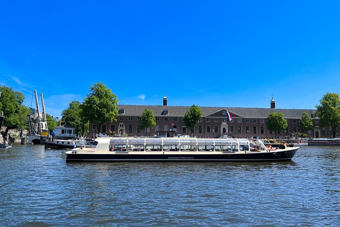Discover Amsterdam: Luxury Canal Cruise with a Local Skipper - Stop-by-Stop: Anne Frank Area, Skinny Bridge Views, 400-Year-Old Buildings, and More