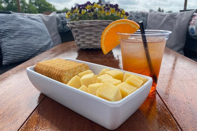 Dutch Cheese & Drinks Guided Amsterdam Boat Tour, All Inclusive - Stop by stop: from 14th-century canals to the city’s oldest landmark