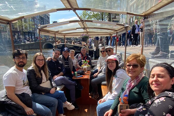 Dutch Cheese & Drinks Guided Amsterdam Boat Tour, All Inclusive - The industrial harbor era, VOC symbolism, and the Amstel shift