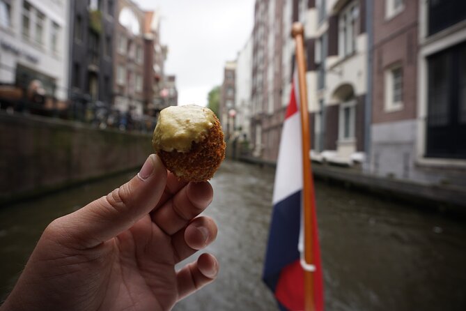 Eating Amsterdam: Food Tour & Canals Cruise - The story walk: Golden Age views and older alley life