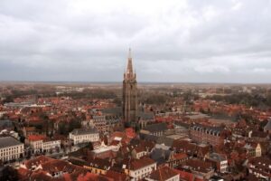 From Amsterdam: Bruges Day Trip in English with Boat Option - Bruges on Foot With an English Guide: Minnewater to Begijnhof