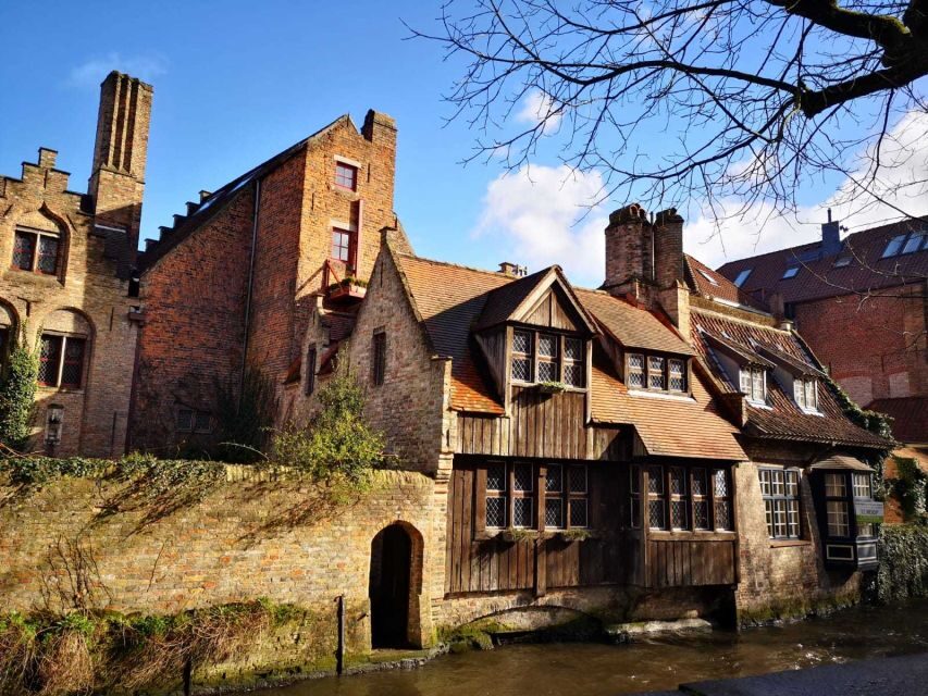 From Amsterdam: Bruges Day Trip in English with Boat Option - Our Lady’s Brick Tower and the Beer Story in the Streets