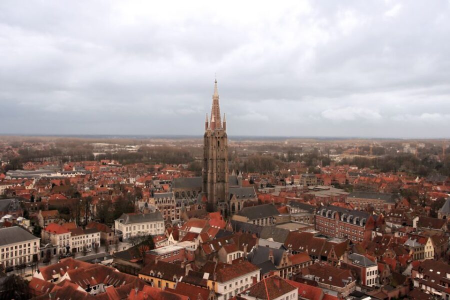 From Amsterdam: Bruges Day Trip in English with Boat Option - Bruges on Foot With an English Guide: Minnewater to Begijnhof