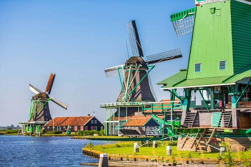 From Amsterdam: Zaanse Schans, Volendam, and Marken Day Trip - All-inclusive upgrade: boat to Marken, operating windmill, and clog-making with steam power