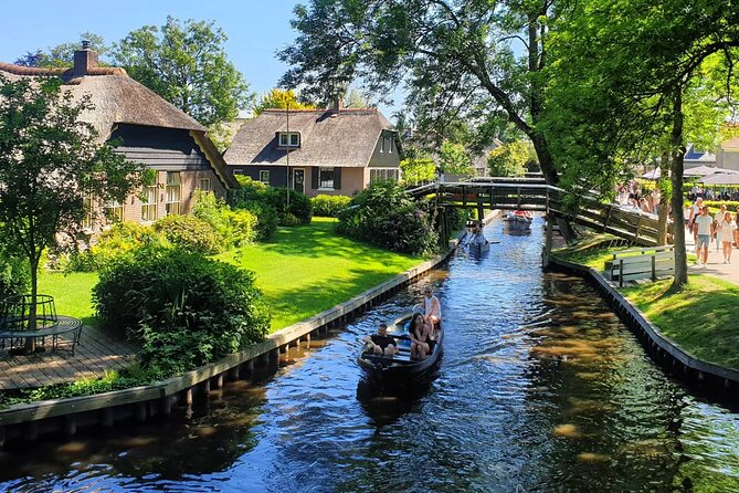 Giethoorn Day Tour from Amsterdam with Small Boat Ride - Getting to Giethoorn: The Amsterdam Start That Sets Your Pace