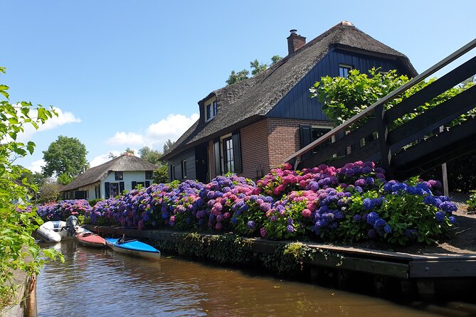 Giethoorn, Zaandam & Zaanse Schans Day Tour w/ Small Boat Ride - Zaanse Schans first: windmills, green houses, and craft demos