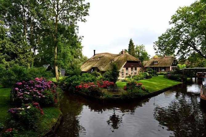 Giethoorn, Zaandam & Zaanse Schans Day Tour w/ Small Boat Ride - The in-between drive: IJsselmeer, Afsluitdijk, and Ketelbrug