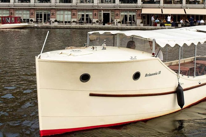 Guided Amsterdam Canal Cruise – Snacks & Drinks on board(1 Hour) - Dutch maritime beginnings: the East India Company ship replica