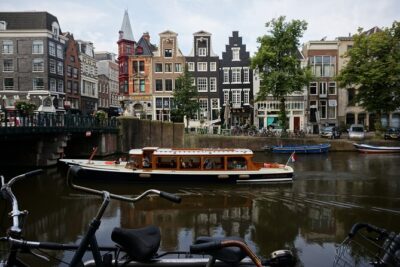 Morning Canal Cruise Amsterdam in Small-Group - The Boat: A 1928 Saloon Ride That Stays Dry