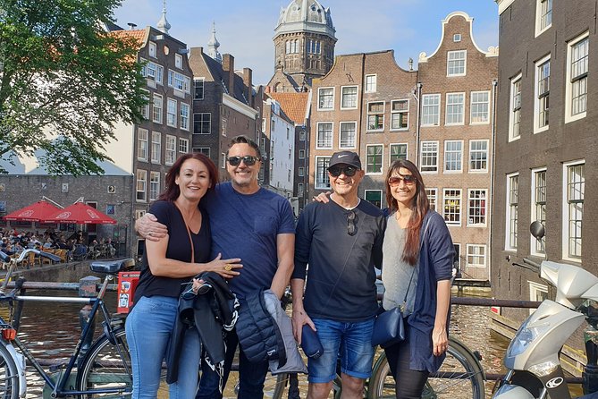 Private Amsterdam Red Light District and Coffee Shop Tour - Damrak and the City Built on Wooden Piles
