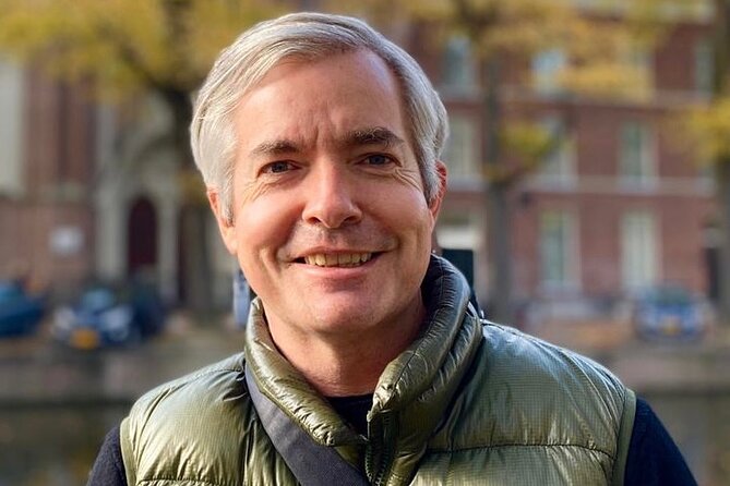 Small Group Walking Tour in Amsterdam with Friendly and Fun Guide - Jordaan: quiet streets, local life, and a different Amsterdam feel
