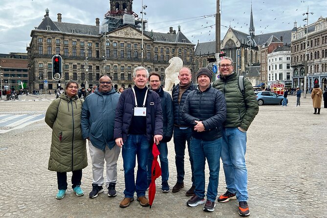 Small Group Walking Tour in Amsterdam with Friendly and Fun Guide - Old Center between Waag and Dam Square: stories you can spot on your own