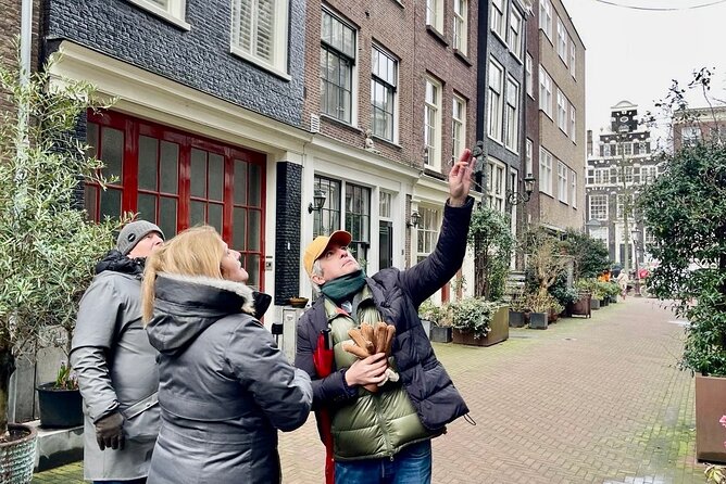 Small Group Walking Tour in Amsterdam with Friendly and Fun Guide - Begijnhof: the calm courtyard break you didn’t know you needed