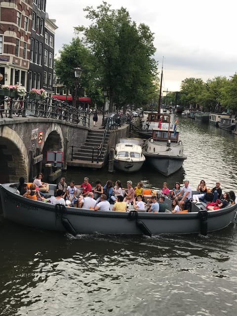 Visit Amsterdam by Boat with a French Guide (french) - Amsterdam Light Festival route option (late Nov to mid Jan)